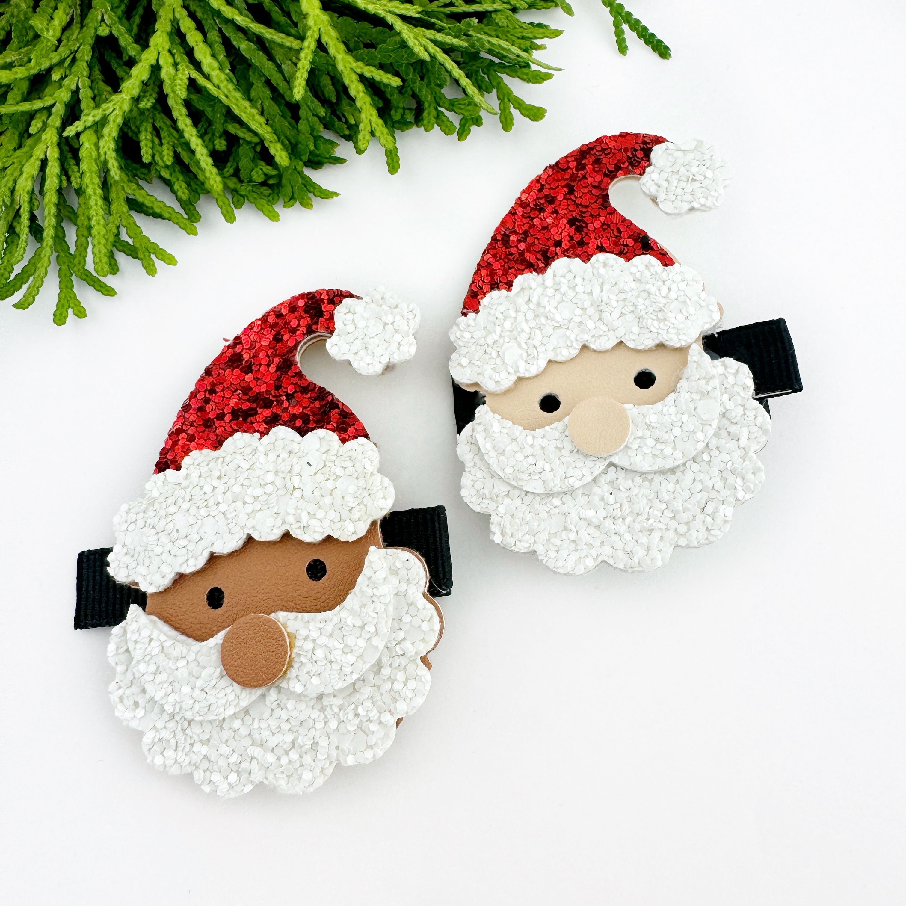 Santa Claus hair clip for little girls, one with a brown Santa and the other with a light beige Santa