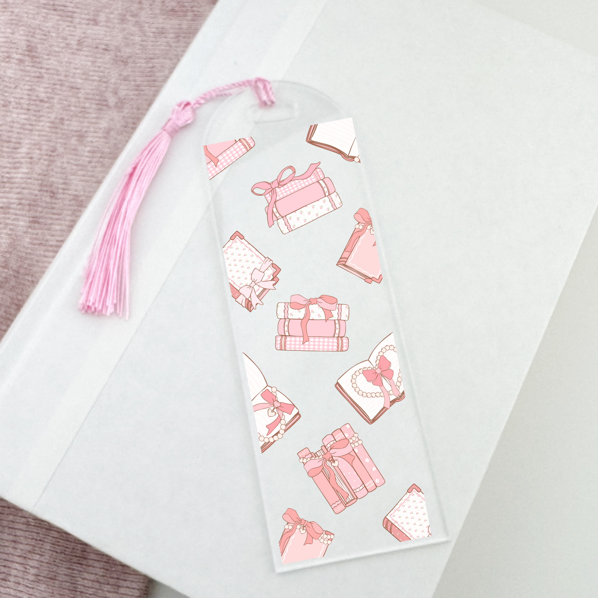 Acrylic bookmark with pink book design and pink tassel