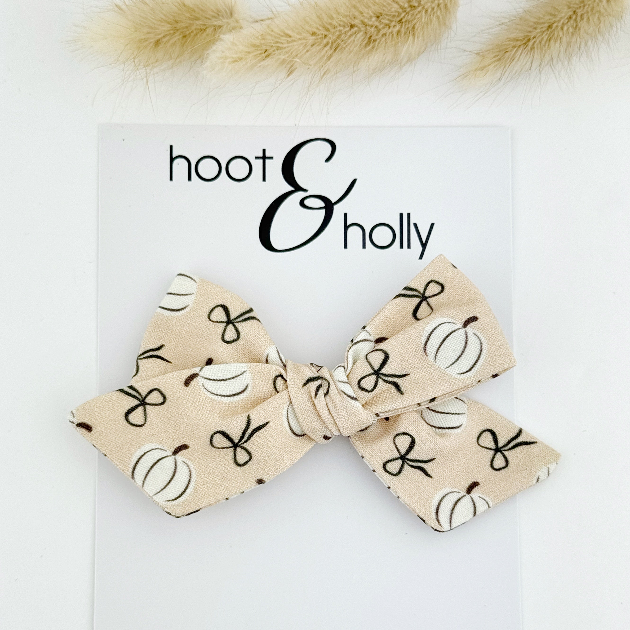 Pumpkin print hand tied girls hair bow