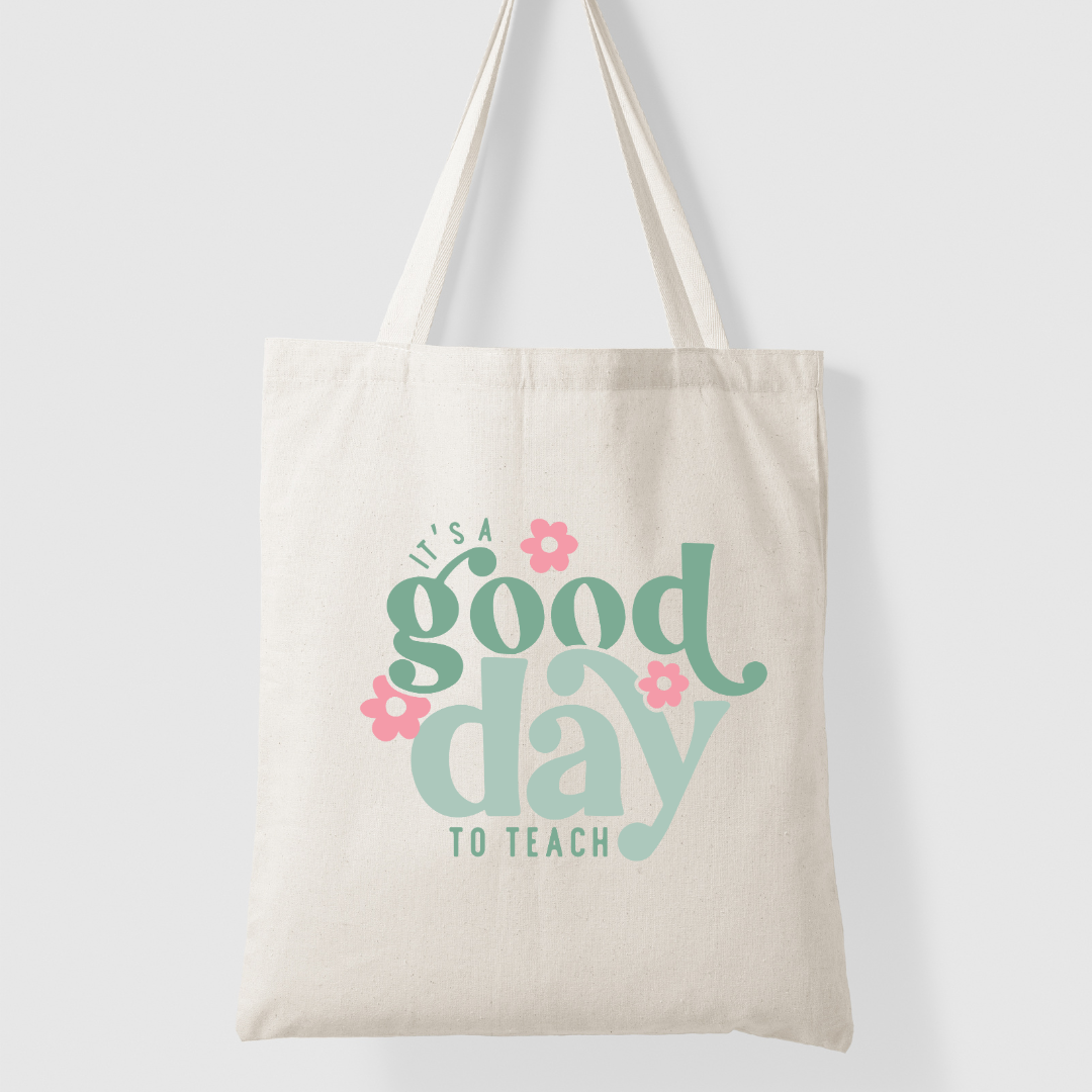 Tote bag with 'It's a good day to teach' text on a white background