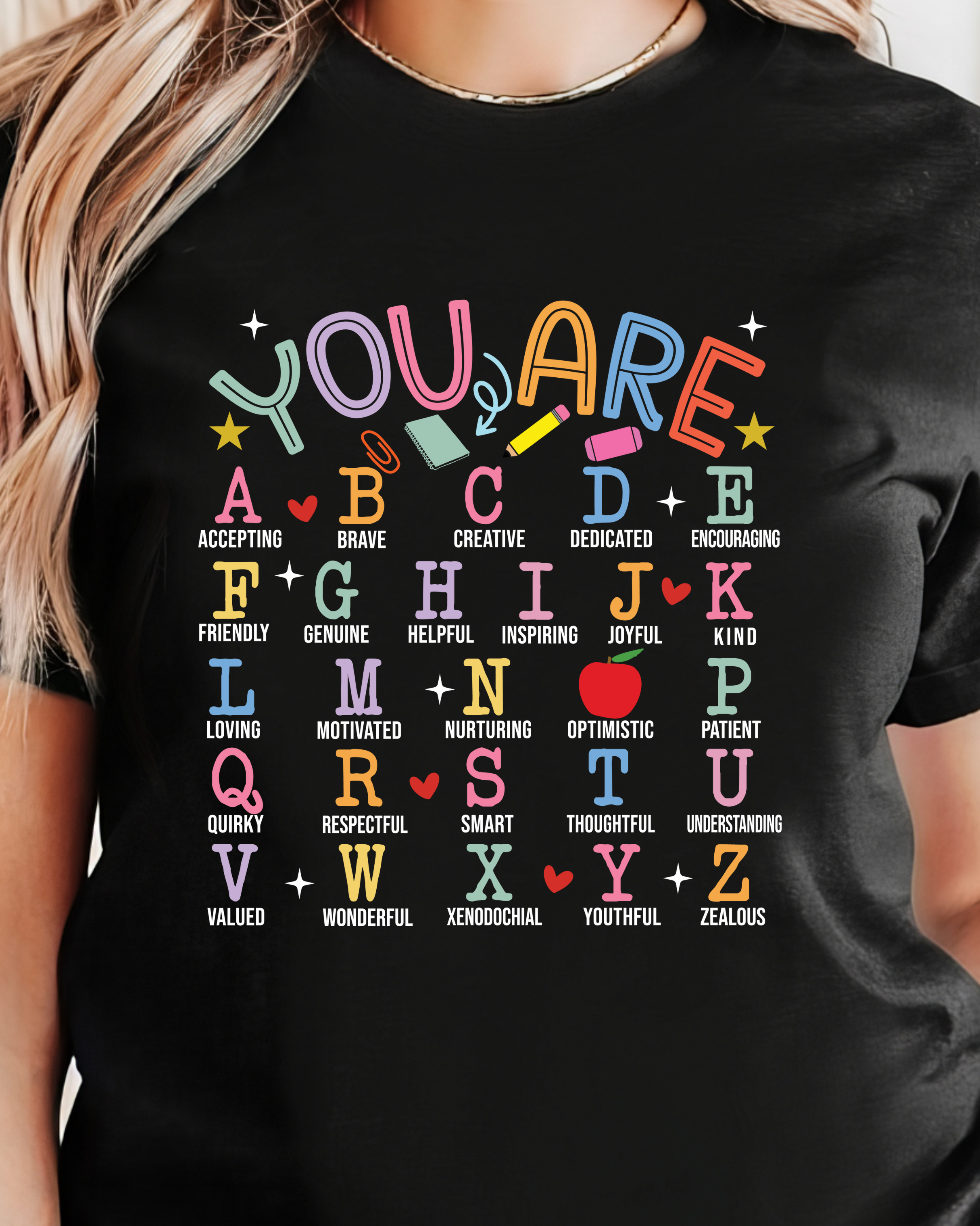 Black t-shirt with colorful alphabet and motivational phrases