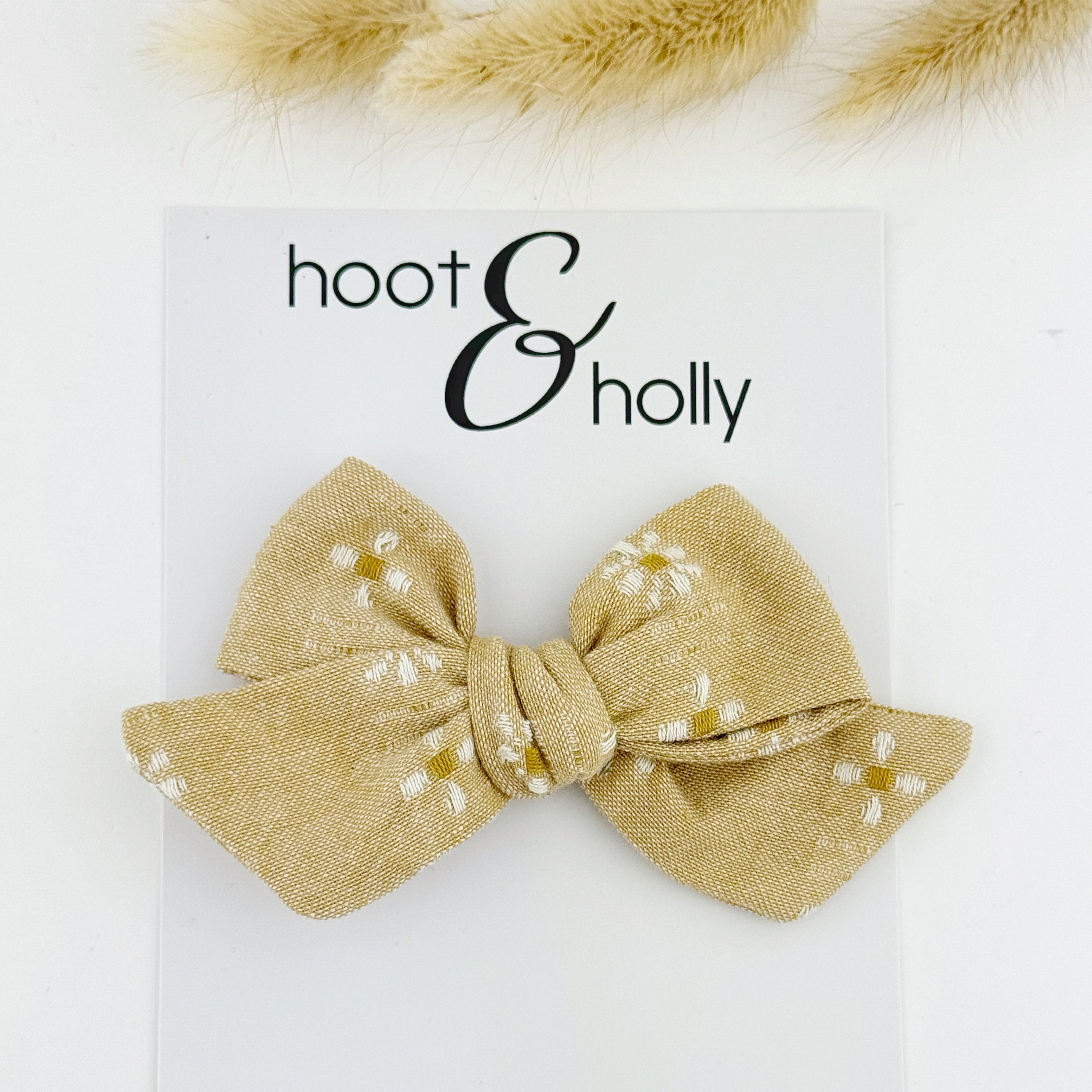 Tan embroidered hand tied girls hair bow