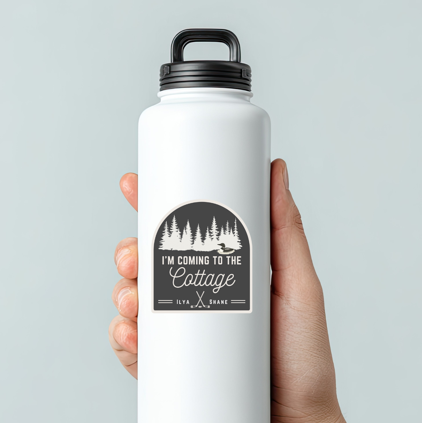 White water bottle with  vinyl sticker "I'm coming to the cottage"
