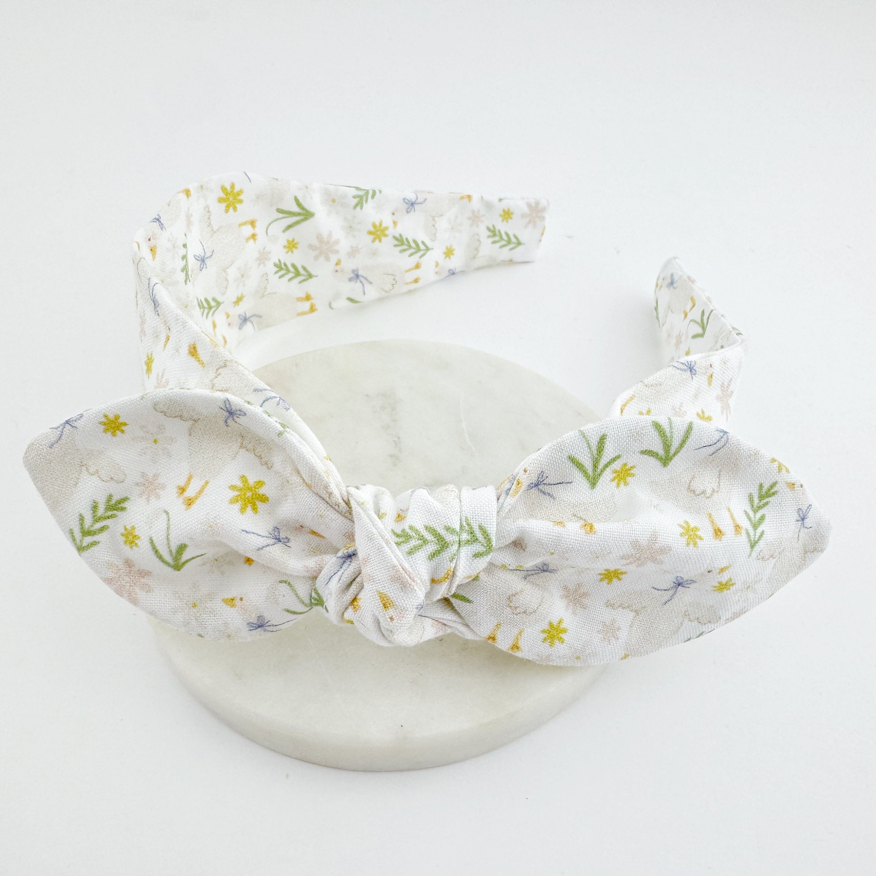Knot bow headband for girls with a Spring flower and goose print.