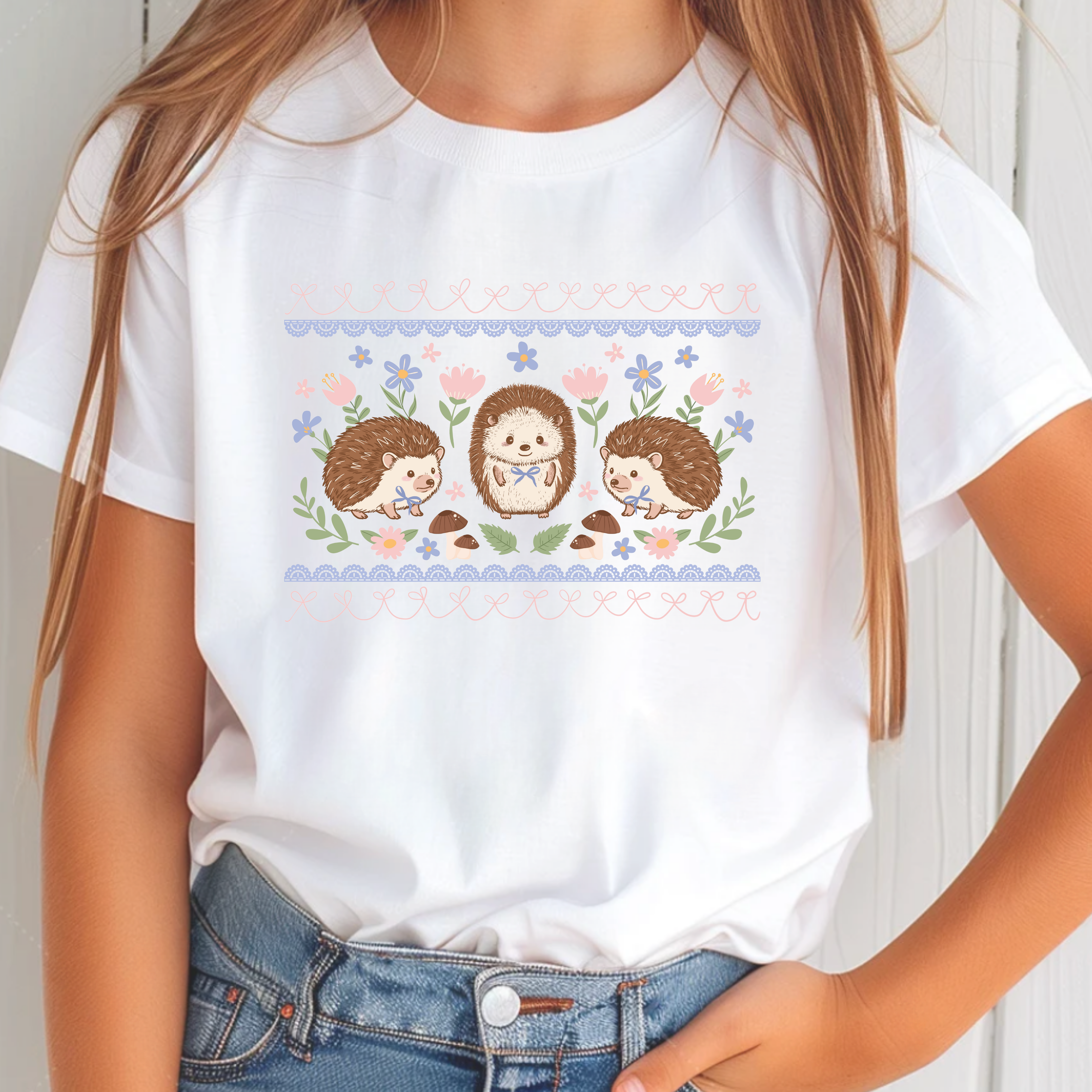 White  youth t-shirt with hedgehog design.