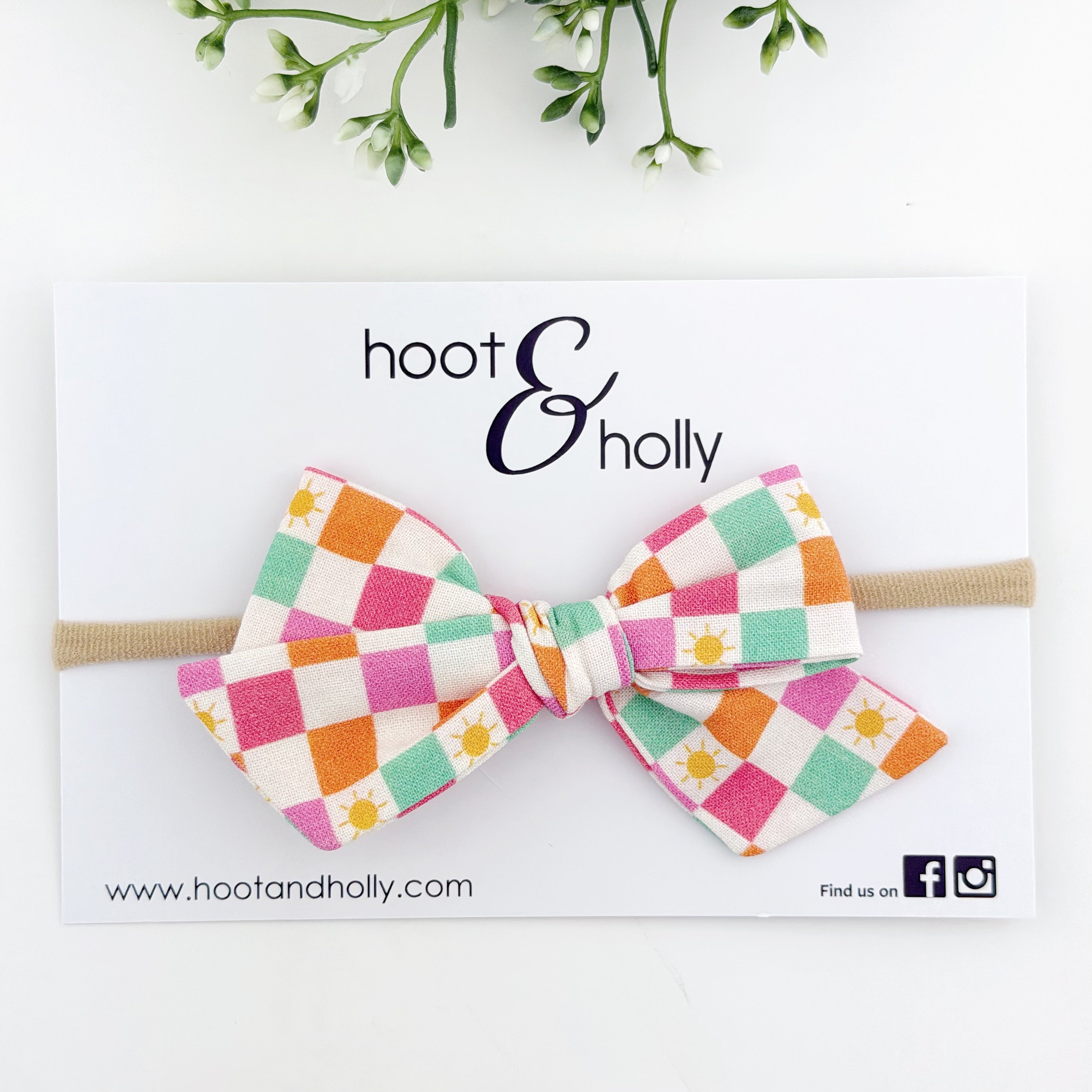 Colorful check hair bow on a nylon headband for baby